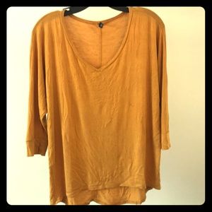 mustard yellow shirt